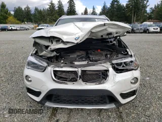 2016 BMW X1 xDrive28i with VIN WBXHT3C39G5E55496, listed as a Copart auction lot 49460233 with 37,934 mi miles. Bid and sale history available at carsss.com. Image 5.