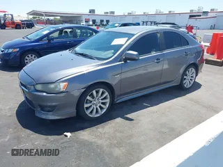 2010 Mitsubishi Lancer GTS z VIN JA32X8HW6AU005689, wystawiony jako IAAI lot #42467923 z przebiegiem 166 508 mil mil oraz . Historia ofert i sprzedaży dostępna na DreamBid. Obrazek 2.