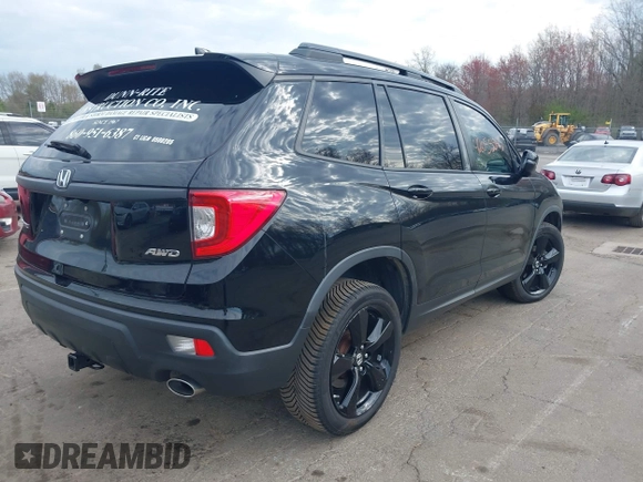 2019 Honda Passport EX-L with VIN 5FNYF8H5XKB024116, listed as a IAAI auction lot 42055543 with 68,641 mi miles and . Bid and sale history available at DreamBid. Image 4.