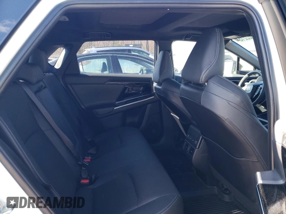 2023 Toyota bZ4X XLE with VIN JTMABACA9PA041997, listed as a Copart auction lot 52922215 with 6,490 mi miles and Salvage Title. Bid and sale history available at DreamBid. Image 11.