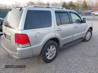 2004 Lincoln Aviator Luxury z VIN 5LMEU88H34ZJ50200, wystawiony jako IAAI lot #41775107 z przebiegiem 220 930 mil mil oraz . Historia ofert i sprzedaży dostępna na DreamBid. Obrazek 4.