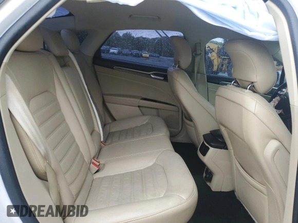 2013 Ford Fusion SE Hybrid with VIN 3FA6P0LU1DR358983, listed as a Copart auction lot 51907665 with 143,459 mi miles and Salvage Title. Bid and sale history available at DreamBid. Image 10.