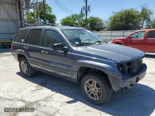 2004 Jeep Grand Cherokee Laredo with VIN 1J4GX48N54C371073, listed as a Copart auction lot 52202855 with 212,368 mi miles and Salvage Title. Bid and sale history available at carsss.com. Image 4.