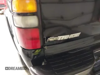 2005 Chevrolet Tahoe LS z VIN 1GNEK13T65J189354, wystawiony jako IAAI lot #42307925 z przebiegiem 166 521 mil mil oraz . Historia ofert i sprzedaży dostępna na DreamBid. Obrazek 12.