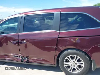 2011 Honda Odyssey EX-L with VIN 5FNRL5H60BB094647, listed as a IAAI auction lot 42223712 with 202,612 mi miles and . Bid and sale history available at carsss.com. Image 14.
