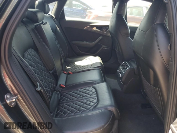2017 Audi S6 Premium Plus z VIN WAUFFAFCXHN012281, wystawiony jako Copart lot #53571455 z przebiegiem 67 439 mil mil oraz Szkoda całkowita • Salvage title. Historia ofert i sprzedaży dostępna na DreamBid. Obrazek 10.