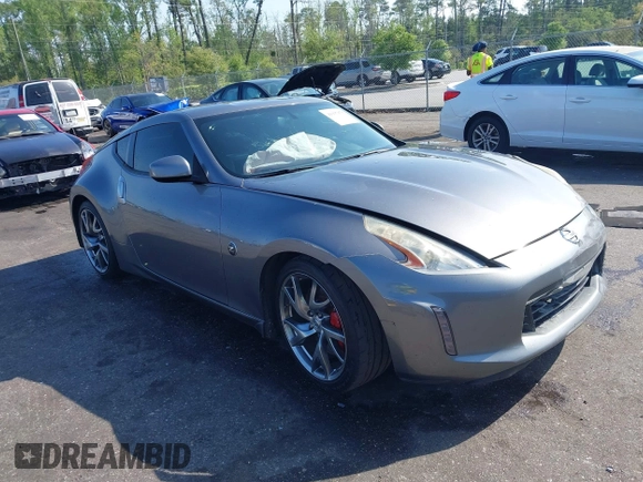 2013 Nissan 370Z with VIN JN1AZ4EH1DM880983, listed as a IAAI auction lot 41937876 with 130,613 mi miles. Bid and sale history available at carsss.com. Image 1.