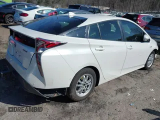 2018 Toyota Prius Two with VIN JTDKBRFU5J3076265, listed as a IAAI auction lot 41646990 with 216,021 mi miles. Bid and sale history available at carsss.com. Image 4.