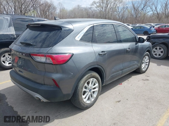 2021 Ford Escape SE with VIN 1FMCU0G61MUB09377, listed as a IAAI auction lot 41897284 with 33,124 mi miles and . Bid and sale history available at DreamBid. Image 4.