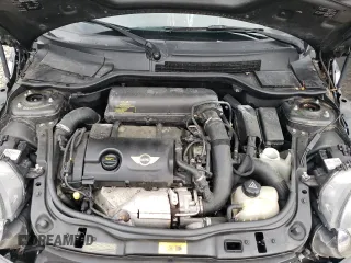 2013 MINI Convertible S с VIN WMWZP3C58DT550592, выставлен на аукционе Copart как лот 56250685 с пробегом 141 821 миль миль и Списание • Salvage title. История ставок и продаж доступна на DreamBid. Изображение 11.