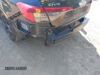 2024 Honda Civic Sport z VIN 2HGFE2F54RH550211, wystawiony jako IAAI lot #42207210 z przebiegiem 66 041 mil mil oraz . Historia ofert i sprzedaży dostępna na DreamBid. Obrazek 19.