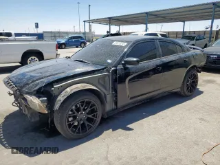 2013 Dodge Charger Police z VIN 2C3CDXAT2DH722403, wystawiony jako Copart lot #59879245 z przebiegiem 195 730 mil mil oraz Szkoda całkowita • Salvage title. Historia ofert i sprzedaży dostępna na DreamBid. Obrazek 1.