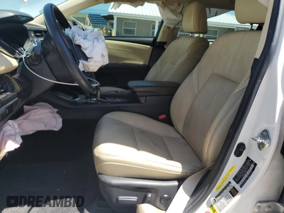 2014 Toyota Avalon Limited z VIN 4T1BK1EB4EU089540, wystawiony jako Copart lot #56886765 z przebiegiem 88 278 mil mil oraz Szkoda całkowita • Salvage title. Historia ofert i sprzedaży dostępna na DreamBid. Obrazek 7.
