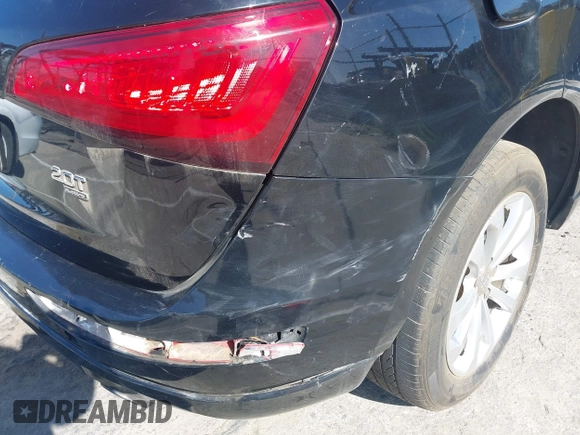 2014 Audi Q5 Premium z VIN WA1CFAFP0EA085858, wystawiony jako IAAI lot #41956522 z przebiegiem Nie podano mil oraz . Historia ofert i sprzedaży dostępna na DreamBid. Obrazek 18.