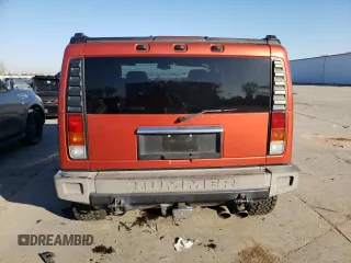 2004 Hummer H2 with VIN 5GRGN23U24H101928, listed as a Copart auction lot 86820104 with 197,079 mi miles and Salvage Title. Bid and sale history available at carsss.com. Image 6.