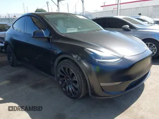 2022 Tesla Model Y Performance z VIN 7SAYGDEF0NF491586, wystawiony jako IAAI lot #42276747 z przebiegiem 117 203 mil mil oraz . Historia ofert i sprzedaży dostępna na DreamBid. Obrazek 1.
