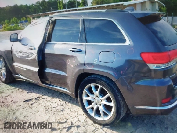 2015 Jeep Grand Cherokee Summit with VIN 1C4RJFJG0FC611768, listed as a IAAI auction lot 42468497 with 217,032 mi miles and . Bid and sale history available at DreamBid. Image 13.