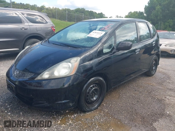 2009 Honda Fit with VIN JHMGE88249S053398, listed as a IAAI auction lot 42818376 with 242,218 mi miles and . Bid and sale history available at DreamBid. Image 2.
