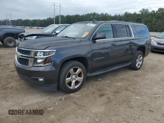 2016 Chevrolet Suburban LT with VIN 1GNSCHKCXGR464772, listed as a Copart auction lot 80065134 with 79,706 mi miles and Salvage Title. Bid and sale history available at carsss.com. Image 1.