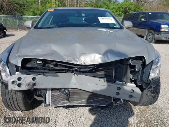 2014 Cadillac ATS Standard AWD z VIN 1G6AG5RXXE0167182, wystawiony jako IAAI lot #42103760 z przebiegiem 66 653 mil mil oraz . Historia ofert i sprzedaży dostępna na DreamBid. Obrazek 6.