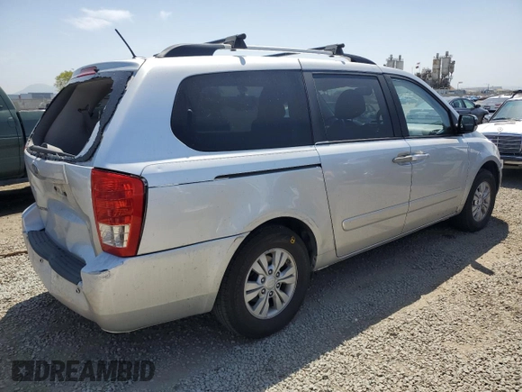 2012 Kia Sedona LX with VIN KNDMG4C72C6445242, listed as a Copart auction lot 54164455 with 143,124 mi miles and Salvage Title. Bid and sale history available at carsss.com. Image 3.