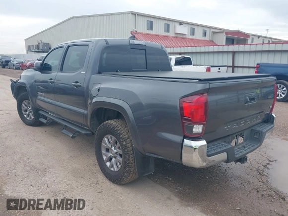 2018 Toyota Tacoma SR5 with VIN 5TFAZ5CN5JX062498, listed as a IAAI auction lot 41867393 with 128,879 mi miles and . Bid and sale history available at DreamBid. Image 3.