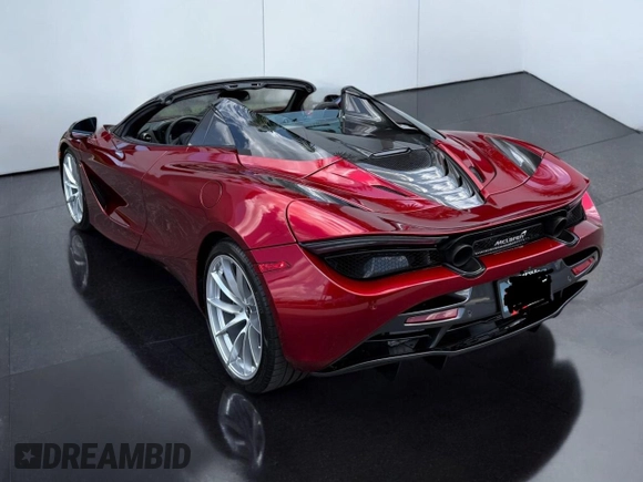 2022 McLaren 720S z VIN SBM14FCA2NW006XXX, wystawiony jako Copart lot #53583055 z przebiegiem 9223 mil mil oraz Tytuł czysty. Historia ofert i sprzedaży dostępna na DreamBid. Obrazek 3.