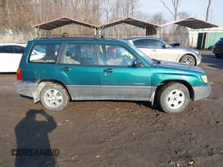 1999 Subaru Forester L with VIN JF1SF635XXH735202, listed as a IAAI auction lot 41489355 with 290,000 mi miles. Bid and sale history available at carsss.com. Image 13.