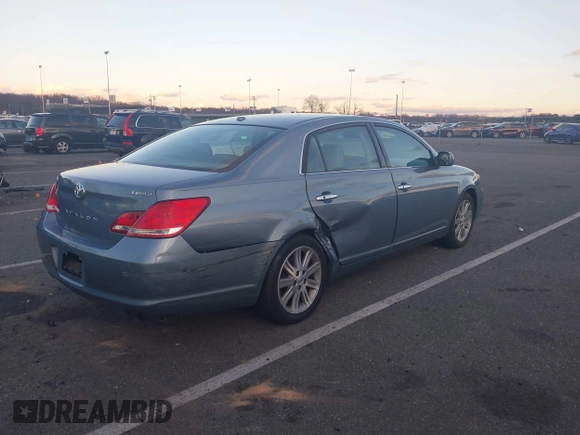 2010 Toyota Avalon XL with VIN 4T1BK3DB1AU363817, listed as a IAAI auction lot 41010053 with 259,106 mi miles and . Bid and sale history available at carsss.com. Image 4.