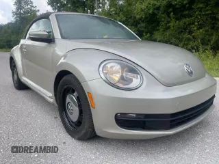 2013 Volkswagen Beetle 2.5L with VIN 3VW5X7AT2DM825928, listed as a Copart auction lot 66500855 with 48,795 mi miles and Salvage title. Bid and sale history available at DreamBid. Image 1.