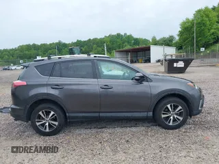 2016 Toyota RAV4 XLE with VIN 2T3RFREV4GW494108, listed as a IAAI auction lot 42234227 with 102,216 mi miles and . Bid and sale history available at DreamBid. Image 13.