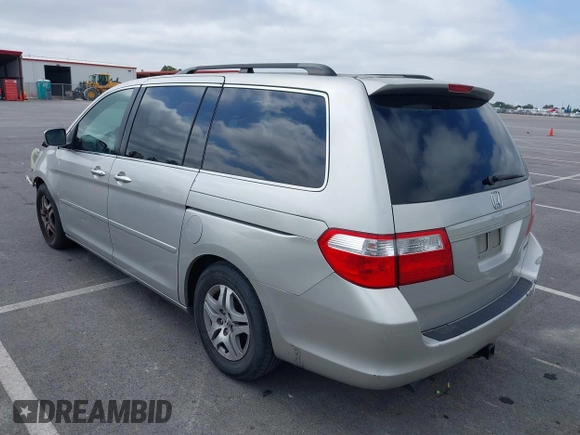 2005 Honda Odyssey EX-L with VIN 5FNRL38745B075486, listed as a IAAI auction lot 42080772 with 197,158 mi miles and . Bid and sale history available at DreamBid. Image 3.