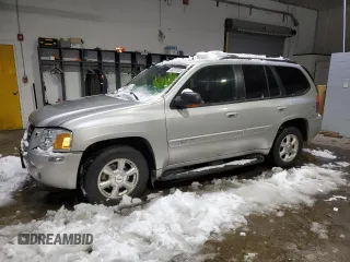 2005 GMC Envoy SLT with VIN 1GKDT13SX52287052, listed as a Copart auction lot 44387855 with 0 mi miles and Salvage Title. Bid and sale history available at carsss.com. Image 1.