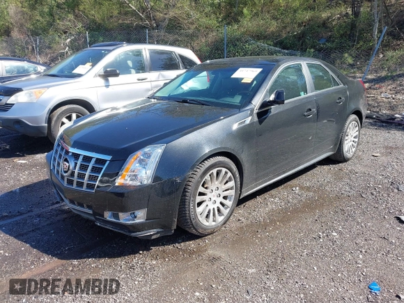 2012 Cadillac CTS Premium with VIN 1G6DP5E3XC0131943, listed as a IAAI auction lot 41747969 with 70,859 mi miles and . Bid and sale history available at DreamBid. Image 2.