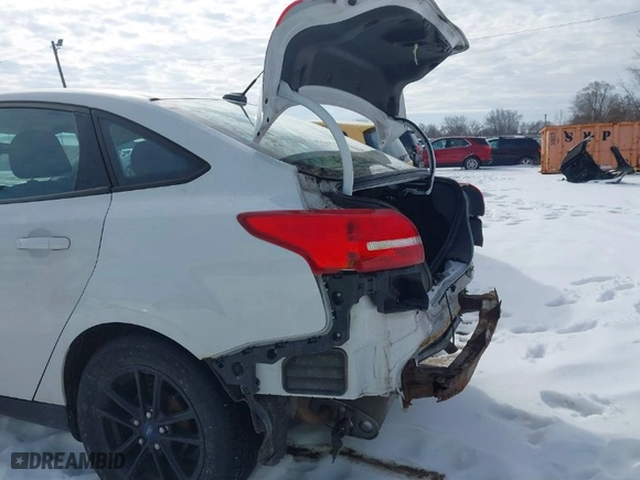 2015 Ford Focus SE with VIN 1FADP3F21FL312736, listed as a IAAI auction lot 41601418 with 137,540 mi miles. Bid and sale history available at carsss.com. Image 6.