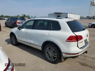 2016 Volkswagen Touareg Sport z VIN WVGEP9BPXGD005351, wystawiony jako Copart lot #60719065 z przebiegiem 133 674 mil mil oraz Czysty tytuł • Clean title. Historia ofert i sprzedaży dostępna na DreamBid. Obrazek 2.
