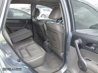 2009 Honda CR-V EX-L with VIN JHLRE387X9C006107, listed as a IAAI auction lot 41714040 with 258,016 mi miles. Bid and sale history available at carsss.com. Image 8.