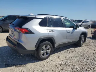 2023 Toyota RAV4 Hybrid LE with VIN JTMLWRFV0PD207803, listed as a Copart auction lot 55694695 with 13,198 mi miles and Salvage title. Bid and sale history available at DreamBid. Image 3.