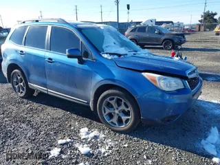 2015 Subaru Forester 2.5i Touring with VIN JF2SJAWC8FH411395, listed as a IAAI auction lot 41511789 with 174,919 mi miles. Bid and sale history available at carsss.com. Image 1.