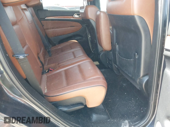 2013 Jeep Grand Cherokee Overland with VIN 1C4RJECT8DC534021, listed as a IAAI auction lot 42058374 with 137,289 mi miles. Bid and sale history available at carsss.com. Image 8.