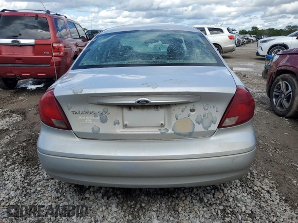 2002 Ford Taurus SES Standard with VIN 1FAFP55U02A115781, listed as a Copart auction lot 59007595 with 97,189 mi miles and Salvage title. Bid and sale history available at DreamBid. Image 6.