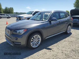2013 BMW X1 xDrive28i z VIN WBAVL1C5XDVR89392, wystawiony jako Copart lot #55699185 z przebiegiem 127 856 mil mil oraz Czysty tytuł • Clean title. Historia ofert i sprzedaży dostępna na DreamBid. Obrazek 1.