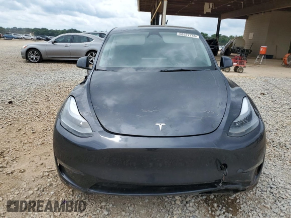 2024 Tesla Model Y Long Range с VIN 7SAYGDEE8RA243340, выставлен на аукционе Copart как лот 60527745 с пробегом 17 307 миль миль и Списание • Salvage title. История ставок и продаж доступна на DreamBid. Изображение 5.