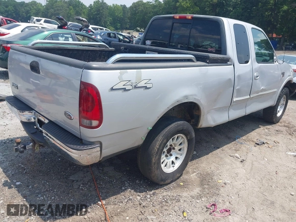 2000 Ford F-150 XL with VIN 1FTRX18L1YNA13975, listed as a IAAI auction lot 42397187 with 235,471 mi miles and . Bid and sale history available at DreamBid. Image 4.