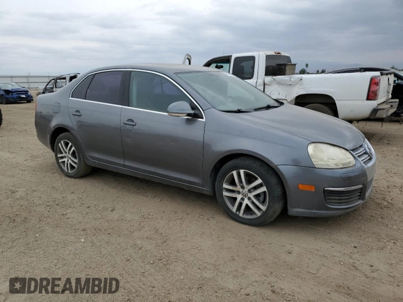 2006 Volkswagen Jetta z VIN 3VWDG71K66M748387, wystawiony jako Copart lot #55269553 z przebiegiem 141 937 mil mil oraz Czysty tytuł • Clean title. Historia ofert i sprzedaży dostępna na DreamBid. Obrazek 4.