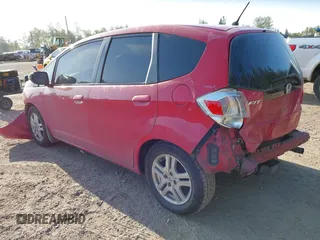 2010 Honda Fit with VIN JHMGE8H29AC008147, listed as a IAAI auction lot 42111220 with 267,843 mi miles. Bid and sale history available at carsss.com. Image 3.