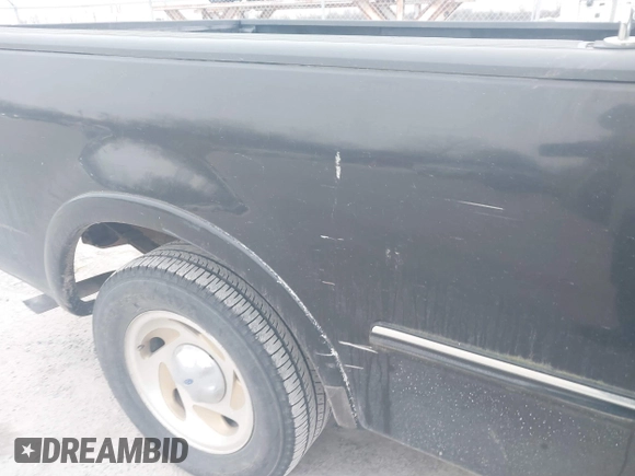 1998 Ford F-150 with VIN 1FTZX1763WNB98605, listed as a IAAI auction lot 41396443 with 116,084 mi miles and . Bid and sale history available at DreamBid. Image 6.