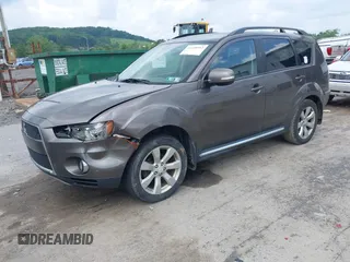 2010 Mitsubishi Outlander XLS z VIN JA4JT4AX6AZ003099, wystawiony jako IAAI lot #42458993 z przebiegiem 218 614 mil mil oraz . Historia ofert i sprzedaży dostępna na DreamBid. Obrazek 2.