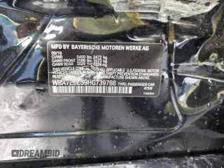 2017 BMW 7 Series 740i with VIN WBA7E2C59HG739788, listed as a Copart auction lot 48073105 with 36,274 mi miles and Salvage Title. Bid and sale history available at carsss.com. Image 12.