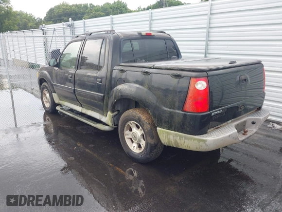 2003 Ford Explorer Sport Trac XLS z VIN 1FMZU67E73UC26464, wystawiony jako IAAI lot #42802849 z przebiegiem 228 139 mil mil oraz . Historia ofert i sprzedaży dostępna na DreamBid. Obrazek 3.